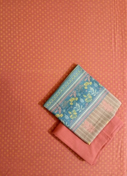 Bonanza Satrangi – Khaddar 3 Piece Suit (Rust Orange & Blue) with Free Pouch