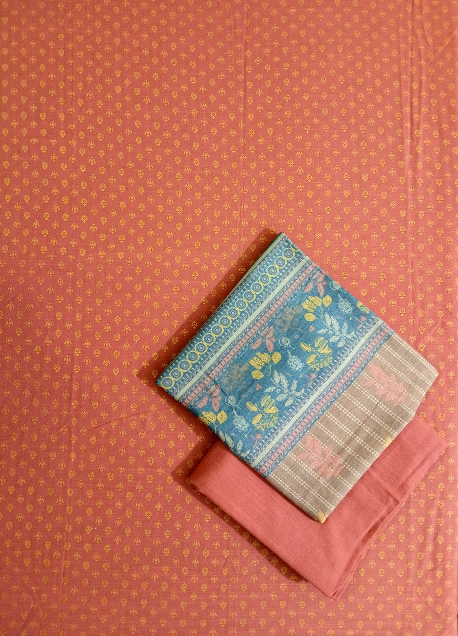 Bonanza Satrangi – Khaddar 3 Piece Suit (Rust Orange & Blue) with Free Pouch